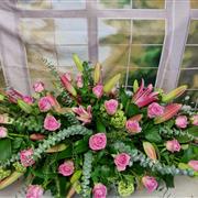 pink lilly and rose casket spray 