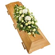 white and green casket spray 